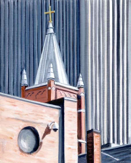 St. Mary's Church Roofline of a church with a cross, juxtaposed against a modern building.